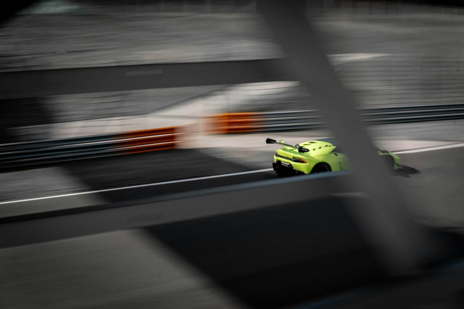 Racing car driving on racing track